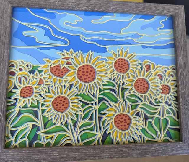 Layered paper artwork by Card and Canvas
