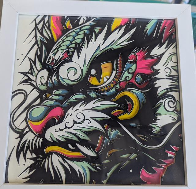 Layered paper artwork by Card and Canvas