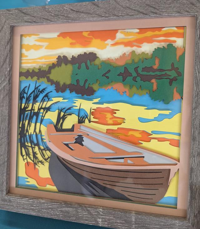 Layered paper artwork by Card and Canvas
